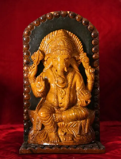 The Seated Ganesha Wooden Carving